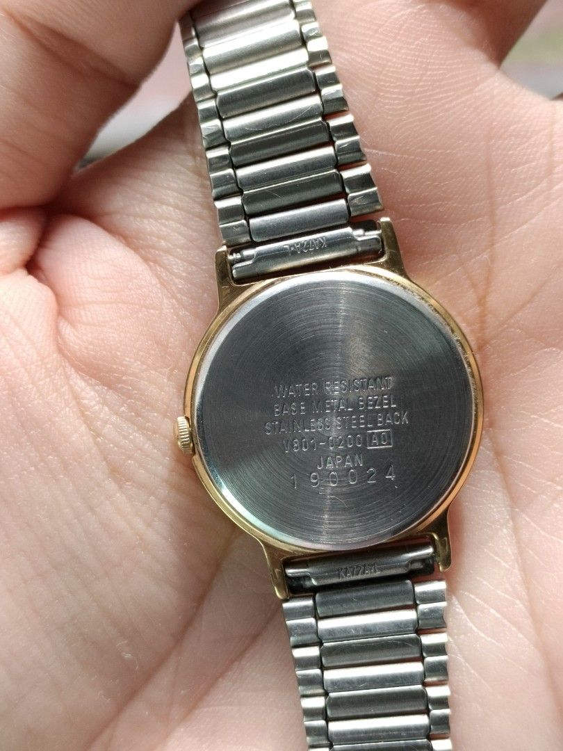 ALBA URBAN (Category: Women's Watches) located in Manila. Submitted by altlazo23 (Listing ID 1460905853, Image 3). Description: - ALBA URBAN Watch - Two-tone stainless steel band - White dial with Roman numeral at 12 o'clock - Water resistant - Base metal bezel - Stainless steel back - Made in Japan - Model: V801-0200 AO - Serial Number: 190024.