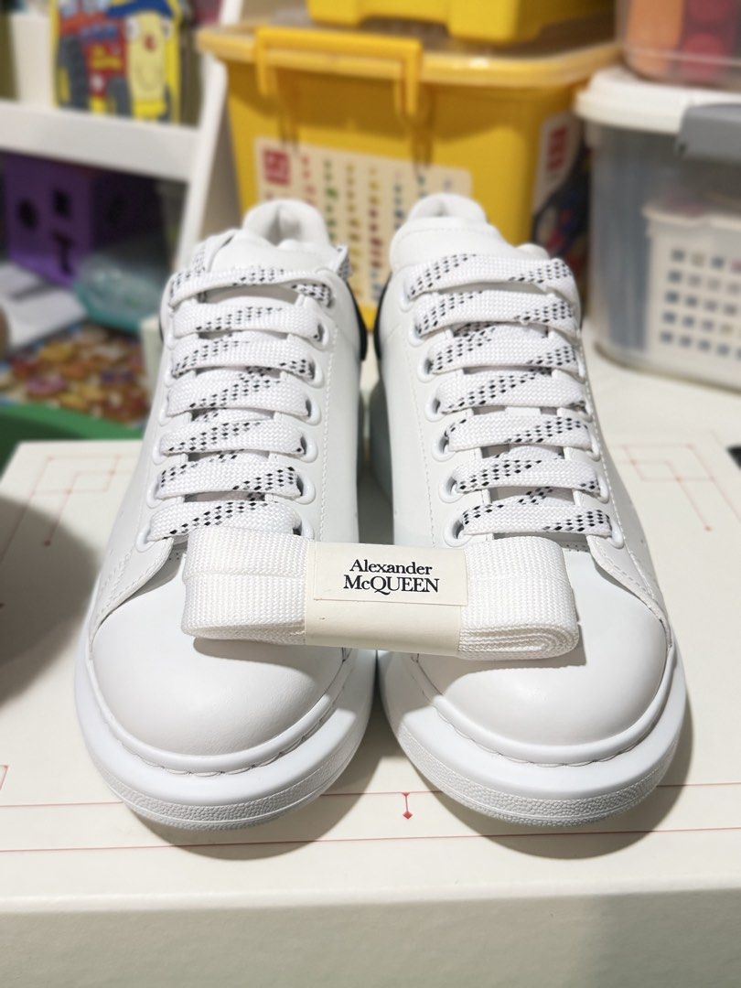 Alexander McQueen Oversized Sneakers White Black (Category: Sneakers) located in Marikina City. Submitted by sisbasco999 (Listing ID 1460861560, Image 1). Description: - Authentic Alexander McQueen Oversized Sneakers - Classic white leather with a stylish black heel tab - Comes with original laces and an additional pair of white laces - Features the iconic chunky sole for a modern look.