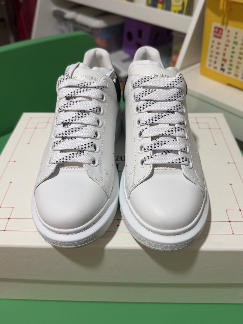 Alexander McQueen Oversized Sneakers White Black (Category: Sneakers) located in Marikina City. Submitted by sisbasco999 (Listing ID 1460861560, Image 3). Description: - Authentic Alexander McQueen Oversized Sneakers - Classic white leather with a stylish black heel tab - Comes with original laces and an additional pair of white laces - Features the iconic chunky sole for a modern look.
