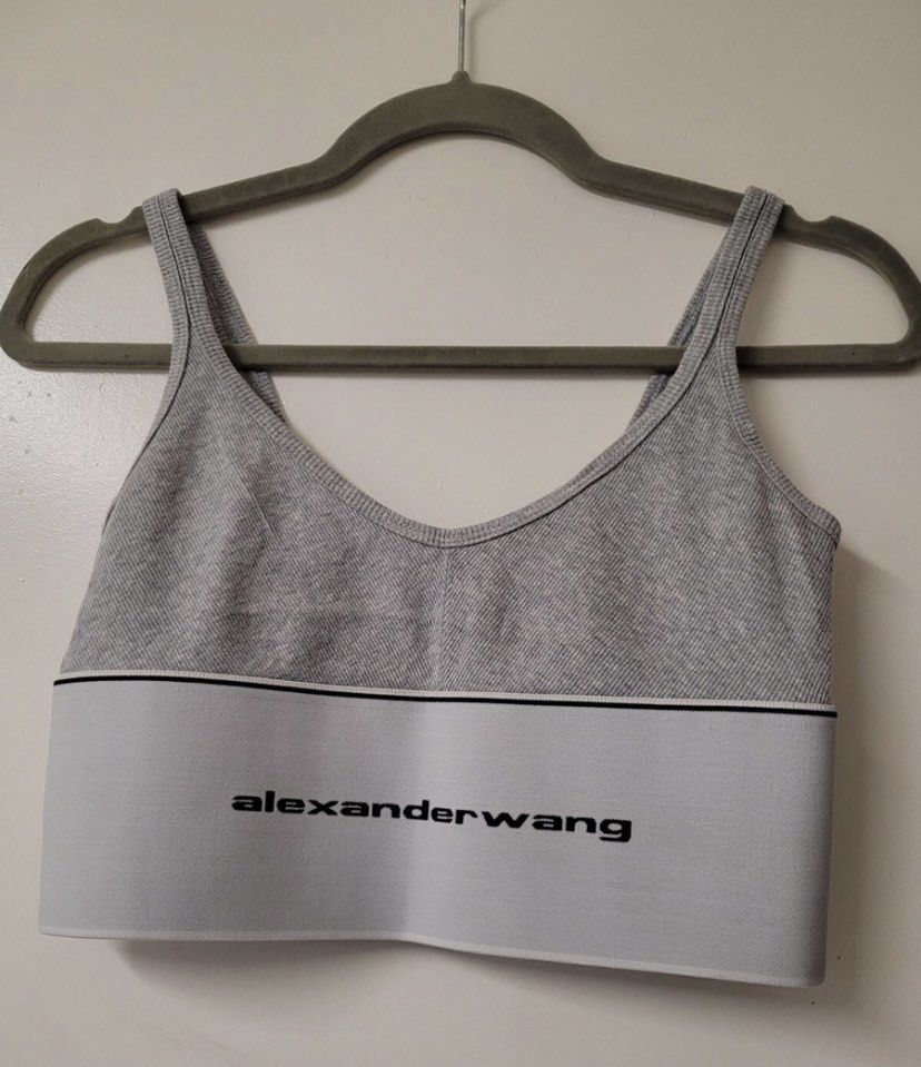 Alexander Wang Grey Sports Bra (Category: Activewear) located in Baguio. Submitted by workwear2600 (Listing ID 1460746584, Image 2). Description: - Grey Alexander Wang sports bra - Signature logo band - Made from 100% cotton - Comfortable for everyday wear or light workouts - Size: L.