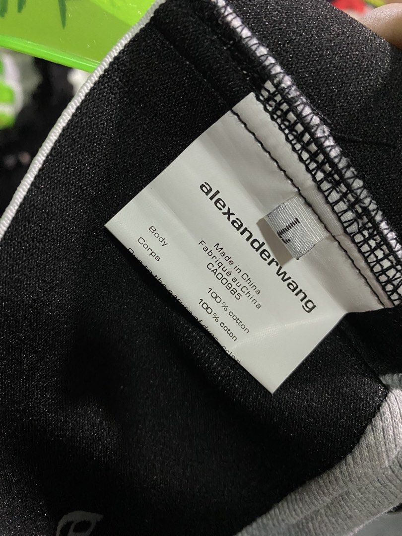Alexander Wang Grey Sports Bra (Category: Activewear) located in Baguio. Submitted by workwear2600 (Listing ID 1460746584, Image 3). Description: - Grey Alexander Wang sports bra - Signature logo band - Made from 100% cotton - Comfortable for everyday wear or light workouts - Size: L.