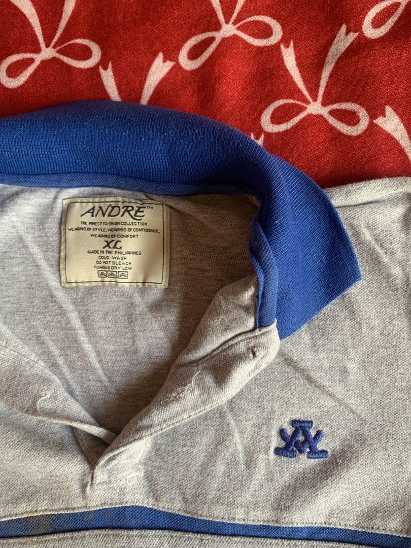 Andre Grey Blue Striped Polo Shirt (Category: Tshirts & Polo Shirts ) located in Navotas City. Submitted by elaitems (Listing ID 1460801811, Image 2). Description: - Dimensions: • width: 22 inches • length: 20 inches •Kids: XL | Adults: S - Negotiable price - PRELOVED! - NOTE‼️ •issues or stain: minor stain on front ( check photos for clear look) - Andre polo shirt .