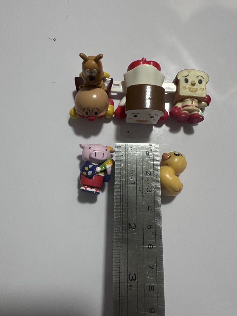 Anpanman and Friends Mini Figures Set only (Category: Designer & Blind Box Toys) located in San Juan City. Submitted by vrgyl (Listing ID 1460830975, Image 3). Description: - Set of Anpanman and Friends mini figures - Includes popular characters: Anpanman, Shokupanman, Baikinman, Melonpanna, Dokinchan, and others - Ideal for Anpanman fans and collectors - Some figures feature small moving parts.