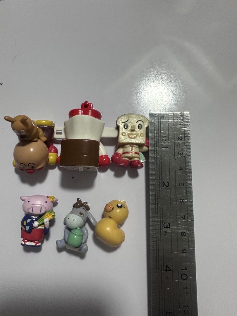 Anpanman and Friends Mini Figures Set only (Category: Designer & Blind Box Toys) located in San Juan City. Submitted by vrgyl (Listing ID 1460830975, Image 2). Description: - Set of Anpanman and Friends mini figures - Includes popular characters: Anpanman, Shokupanman, Baikinman, Melonpanna, Dokinchan, and others - Ideal for Anpanman fans and collectors - Some figures feature small moving parts.