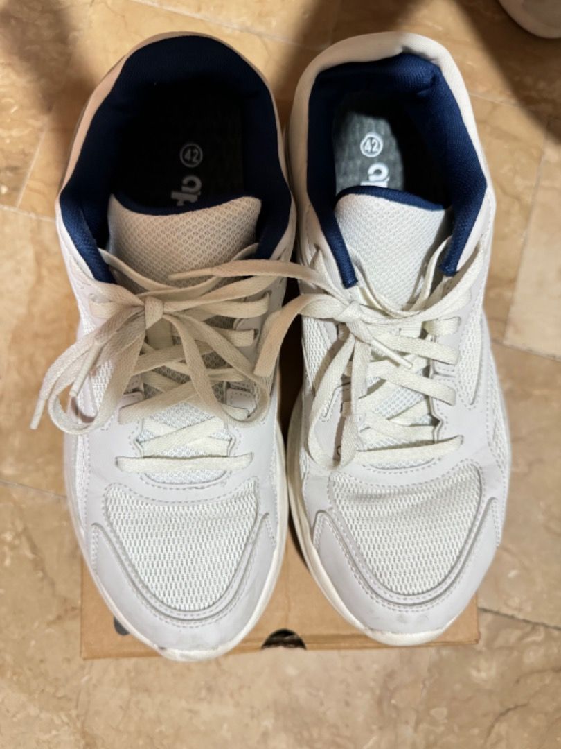 ANTA White & Blue Mesh Sneakers (Category: Sneakers) located in Manila. Submitted by tamcloset960 (Listing ID 1460889522, Image 2). Description: - Brand: ANTA - Color: White and Blue - Size: US 7.5 / UK 5 / EUR 38.5 - Features: Breathable mesh upper, lace-up closure - Ideal for: Casual wear or light athletic activities - Origin: Made in China.