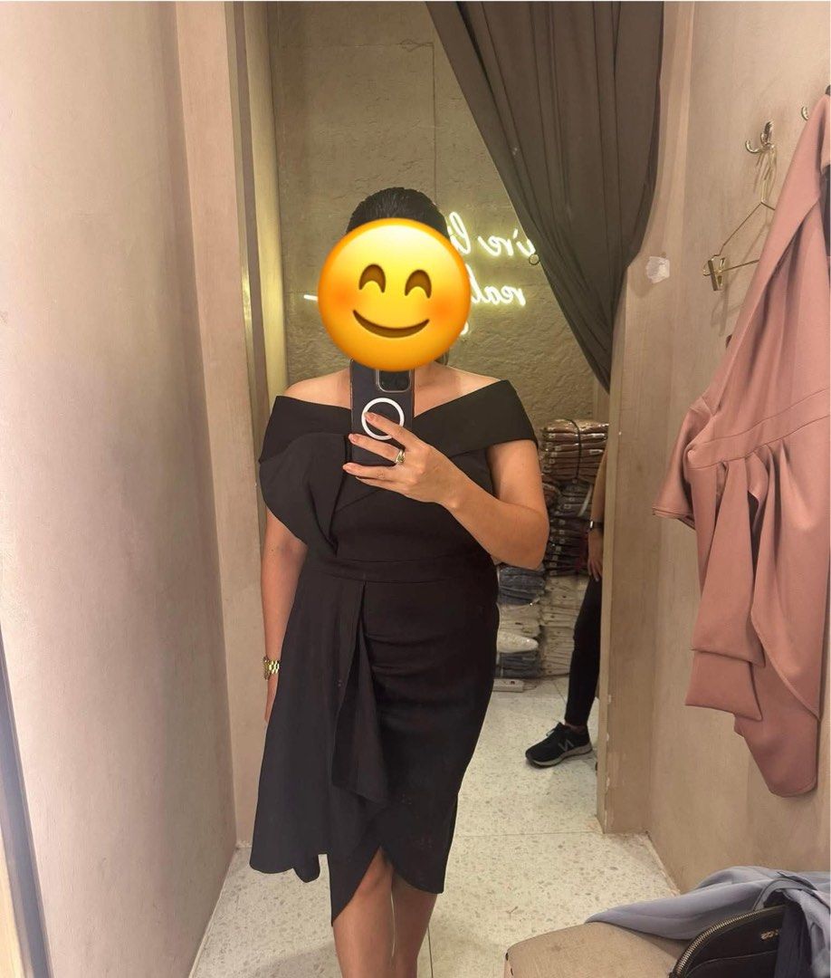 Apartment 8 Black Off-Shoulder Drape Dress (Category: Dresses) located in Taguig. Submitted by janereglo (Listing ID 1460863288, Image 1). Description: Bought for 6000. Used just once for graduation. - Elegant black off-shoulder dress. - Draped front detail - Asymmetrical hemline - Wrap-style skirt detail - Ideal for events or a night out - Flattering fit that enhances your figure - Comfortable to wear.