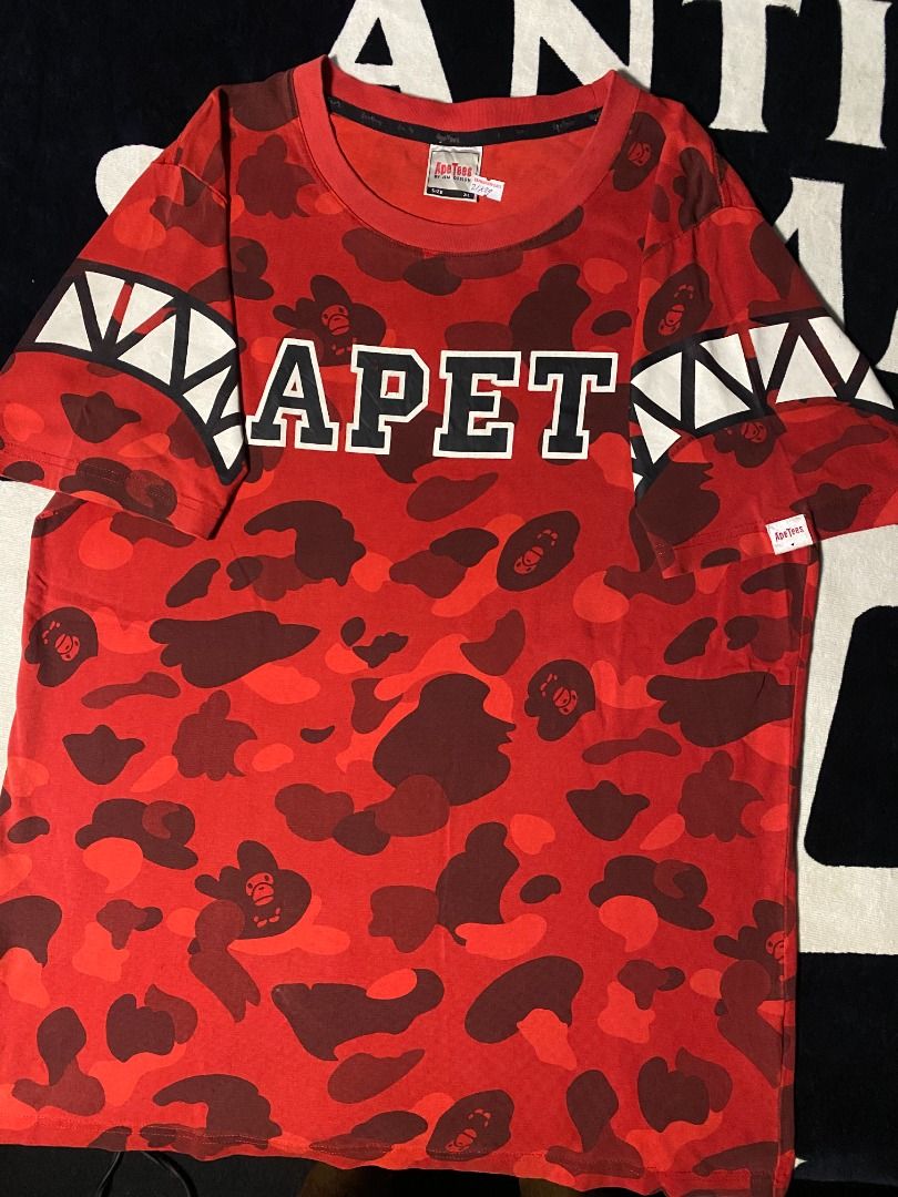 ApeTees red camo | shirt (Category: Tshirts & Polo Shirts ) located in Las Pinas. Submitted by all_details_posted (Listing ID 1460850193, Image 1). Description: rubberized print bakbak ibang print sa sleeves, cracked print, cr 8/10.