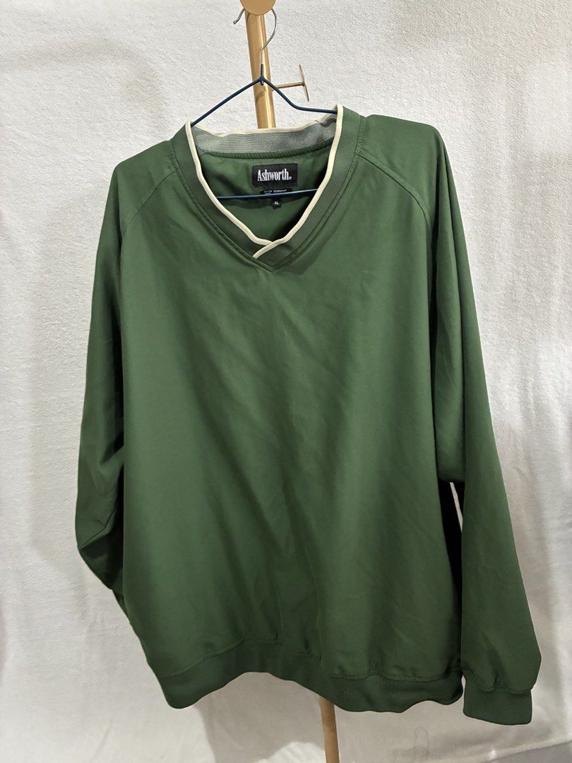 Ashworth Green Water Resistant Wind Resistant Pullover XL (Category: Coats, Jackets and Outerwear) located in Paranaque City. Submitted by madane_626 (Listing ID 1460751195, Image 1). Description: - Ashworth Pullover - Color: Green - Size: XL - Features: Water resistant, Wind resistant - Design: V-neck with striped trim - Ideal for: Outdoor activities - Origin: Made in Taiwan.