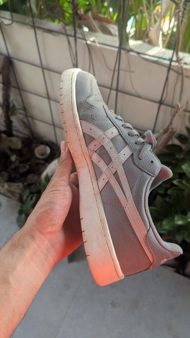 Asics Grey Leather Sneakers (Category: Sneakers) located in Mati. Submitted by kepsky00 (Listing ID 1460781309, Image 3). Description: - Grey Asics sneakers - Leather upper with white accents - Features Ortholite insole for comfort - Soles show some wear, but plenty of life remaining - Ideal for casual wear or light activity - Sold as is.