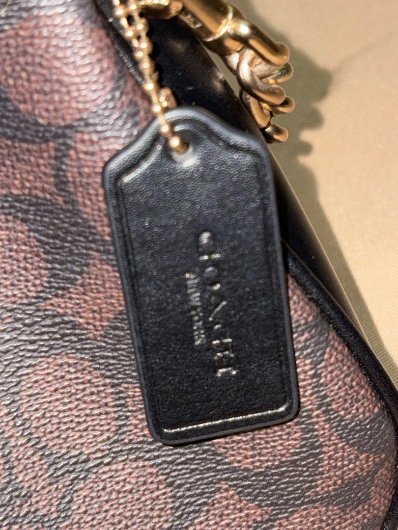 Authentic Coach C2479-CV933 Teri Shoulder Bag (Category: Shoulder Bags) located in Manila. Submitted by mikrokosmos.__ (Listing ID 1460815419, Image 3). Description: Authentic Coach C2479-CV933 Teri Shoulder Bag Classic Coach Teri Shoulder Bag in brown Signature Canvas. Timeless, elegant, and easy to style—perfect for everyday use or special occasions. Details: * Brand: Coach * Model: C2479-CV933 * Color: Brown / Signature Canvas * Style: Teri Sh