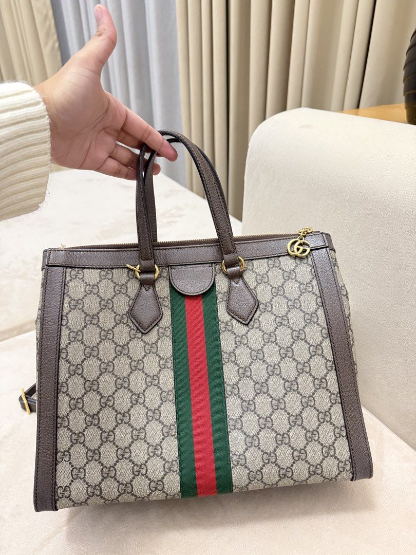 Authentic Gucci Ophidia Medium Tote Bag (Category: Luxury Bags & Wallets) located in Manila. Submitted by maria_2326 (Listing ID 1460901980, Image 3). Description: Gucci Ophidia Medium Tote Bag Guarantee Authentic Inclusions: Dust Bag, strap, and entrupy No lowballing! Location: Manila/QC.