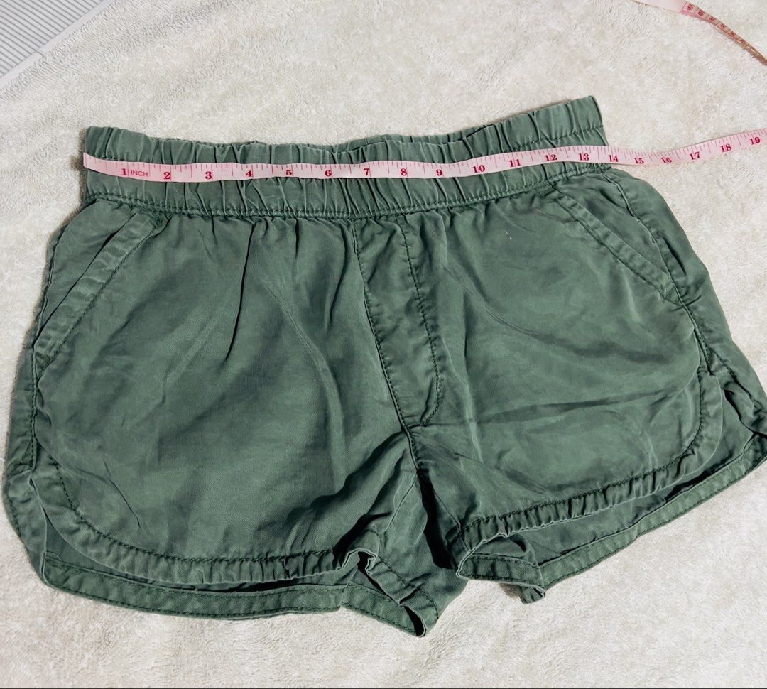 Bundle!!! Authentic preloved American Eagle & Yishion Shorts Bundle - White, Khaki, Green (Category: Shorts) located in Binan City. Submitted by unicohijoxfudge (Listing ID 1460866074, Image 2). Description: - Bundle of 3 shorts from American Eagle and Yishion. - Includes: 1 White (sold na), 1 Khaki, 2 Green pairs. - White shorts feature floral lining and button closure. - Green shorts have an elastic waistband for comfort. - Ideal for everyday c