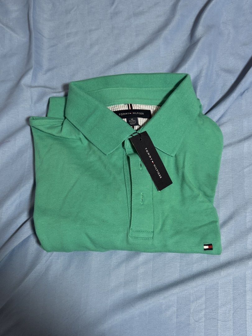 AUTHENTIC Tommy Hilfiger Polo Shirt (Category: Formal Shirts) located in Manila. Submitted by blueishbaddie (Listing ID 1460738213, Image 1). Description: AUTHENTIC Tommy Hilfiger Polo Shirt - bought in Canada - orig price: $120 CAD w tax / ₱5,471 - never been worn, brand new (tag still intact) - loc: ust españa/lipa batangas.