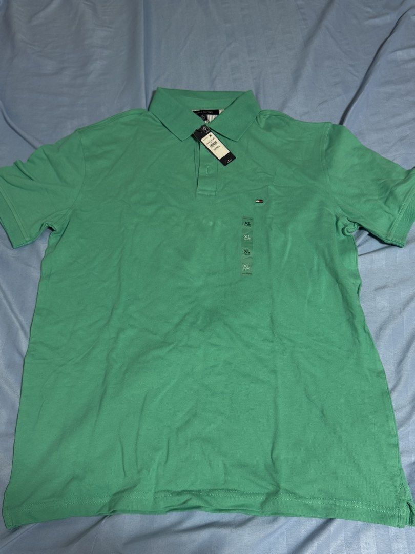 AUTHENTIC Tommy Hilfiger Polo Shirt (Category: Formal Shirts) located in Manila. Submitted by blueishbaddie (Listing ID 1460738213, Image 2). Description: AUTHENTIC Tommy Hilfiger Polo Shirt - bought in Canada - orig price: $120 CAD w tax / ₱5,471 - never been worn, brand new (tag still intact) - loc: ust españa/lipa batangas.