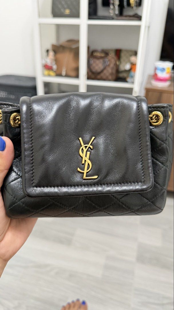 Authentic YSL mini Bag (Category: Luxury Bags & Wallets) located in Makati City. Submitted by angie03191 (Listing ID 1460885601, Image 2). Description: Comes with box,dustbag,care card, original tag, paper bag Barely used- can pass new. Only flaws buttons as per image but normal.