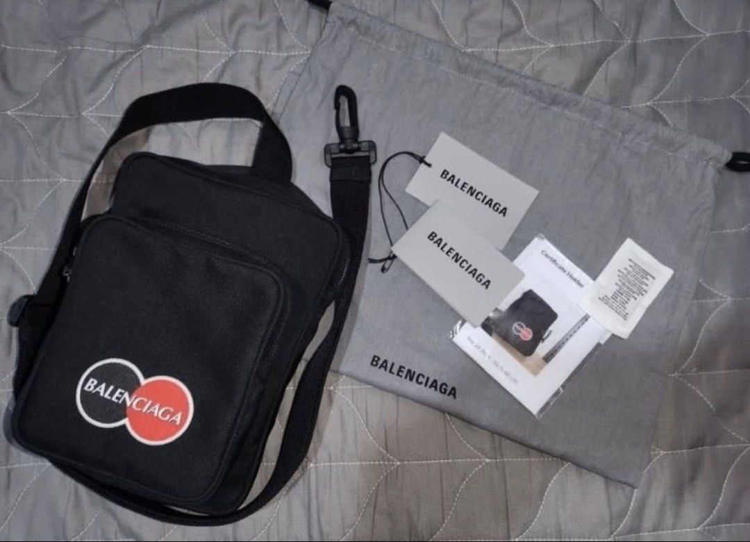 Balenciaga cross body bag (Category: Luxury Bags & Wallets) located in Makati City. Submitted by robrobrob23 (Listing ID 1460857208, Image 2). Description: Balenciaga mastercard pouch bag with dustbag with authenticity cards with entrupy certificate stored unused condition no flaws slightly negotiable for sure buyer.