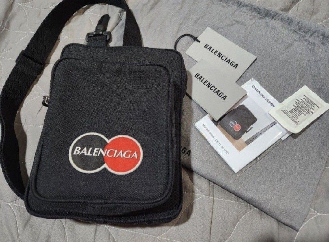 Balenciaga cross body bag (Category: Luxury Bags & Wallets) located in Makati City. Submitted by robrobrob23 (Listing ID 1460857208, Image 1). Description: Balenciaga mastercard pouch bag with dustbag with authenticity cards with entrupy certificate stored unused condition no flaws slightly negotiable for sure buyer.