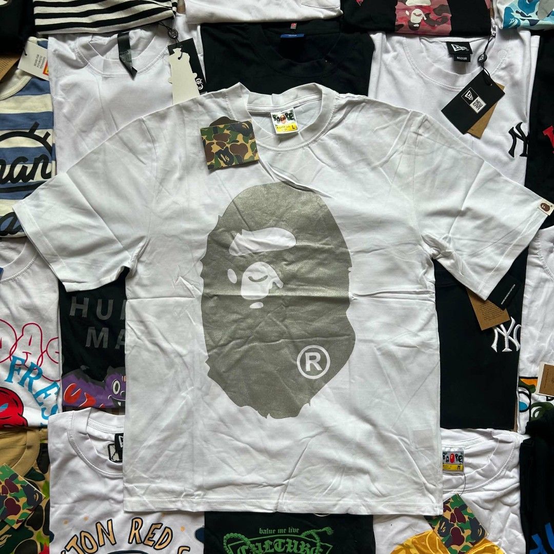 BAPE big logo shirt (Category: Tshirts & Polo Shirts ) located in Taytay. Submitted by game.man999 (Listing ID 1460718759, Image 2). Description: Bape black big logo money size XL Bape white big logo silver size L brand new both with Ziplocks and tags Taytay loc.