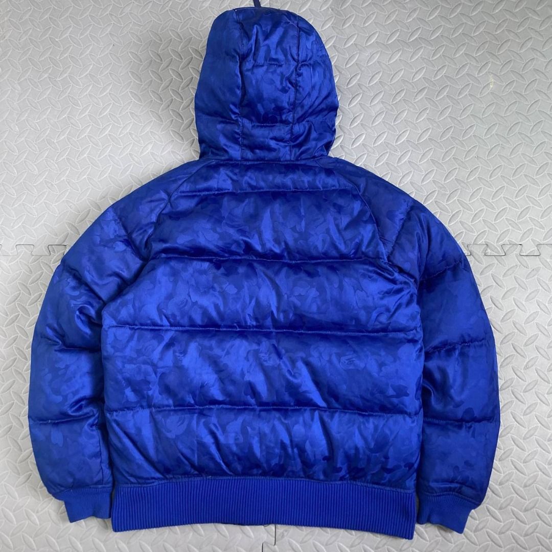 Bape -Hidden Camo Mountain Down Jacket (Category: Coats, Jackets and Outerwear) located in Quezon City. Submitted by archived.g (Listing ID 1460905977, Image 2). Description: Bape -Hidden Camo Mountain Down Jacket - Brand: Bape Made in: China Year: Material: Polyester, Nylon, Down Color: Blue Marked size: L Sizing: Measurements (laid flat): Shoulders: 18" Sleeves: 24” Width: 21.5” Hem: 19.5" Length: 26.5” Color rating: 9/10 Condition: 8.5/10 Flaw