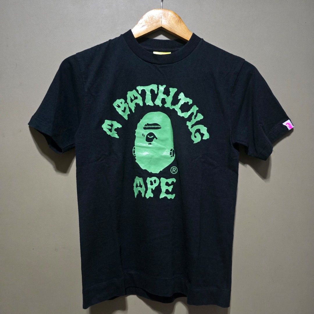BAPE OG COLLEGE LOGO TEE ( WOMENS ) AUTHENTIC 💯 (Category: Shirts) located in Manila. Submitted by thrift-finds.ph (Listing ID 1460746293, Image 1). Description: BAPE OG COLLEGE LOGO TEE ( WOMENS ) AUTHENTIC💯 - Size: XS - Excellent Condition ( Vintage ) Issue: Minor Hairline Crackprint ( See Last Photo ).