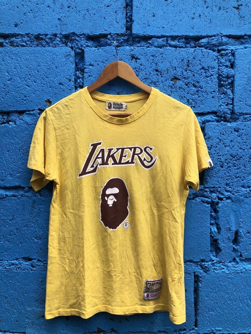 bape x lakers (Category: Tshirts & Polo Shirts ) located in Manila. Submitted by thriftyah_23 (Listing ID 1460776469, Image 2). Description: BAPE x Mitchell & Ness Lakers Tee 27’20.