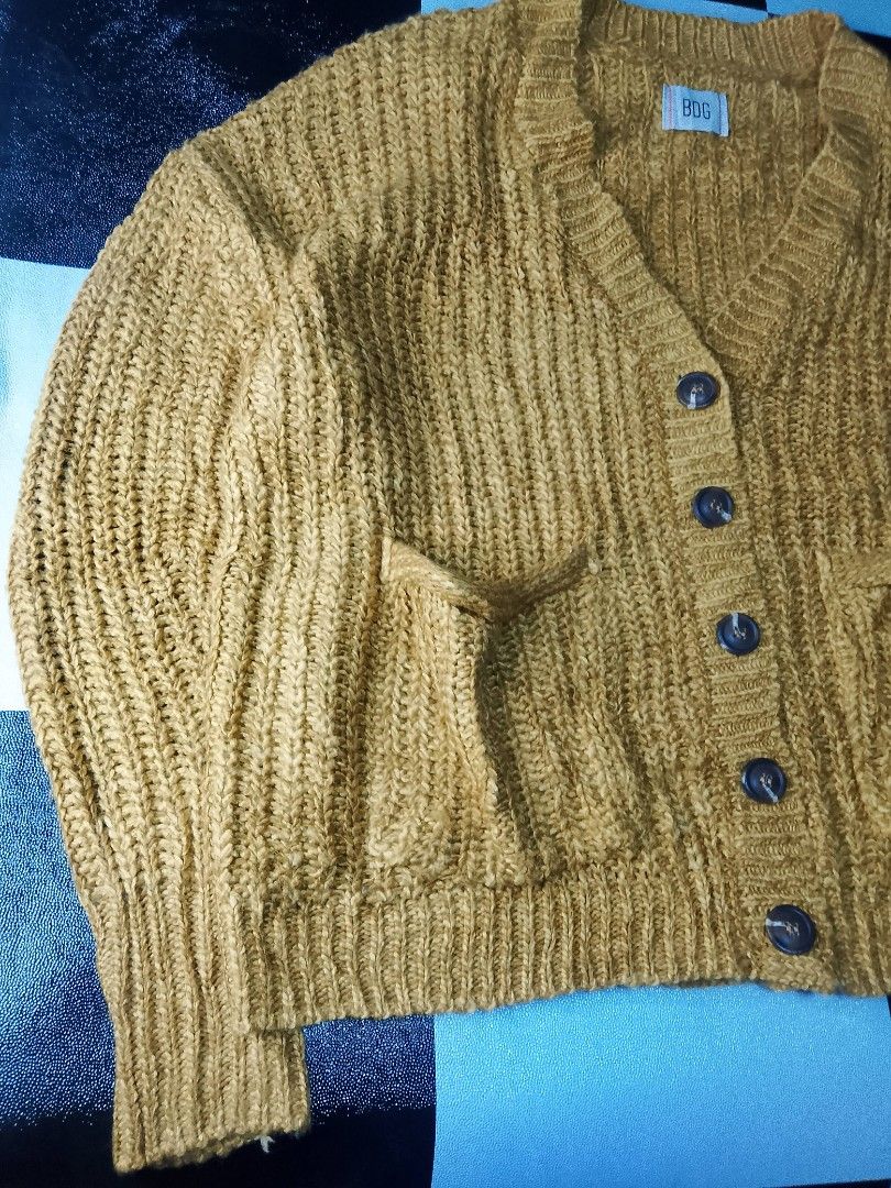 BDG Mustard Cropped Knitted Cardigan (Category: Coats, Jackets and Outerwear) located in Binan City. Submitted by incnt (Listing ID 1460794022, Image 2). Description: 300 Pesos only add shipping fee BDG Knitted Cardigan Unisex Cropped Fit 24*23 Very good Condition no issues Need wash only Pm- Biñan Laguna Location "All brand names, logos, and images are registered trademarks of their respective owners. No affiliation or copyright infringement int