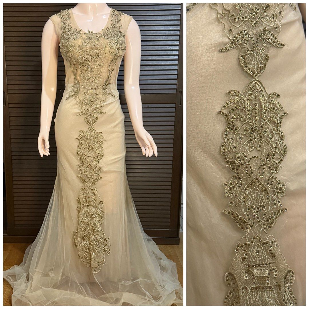 Beaded Lace Evening Gown (Category: Evening dresses & gowns) located in Santiago. Submitted by jy.collection (Listing ID 1459649797, Image 1). Description: - Cream-colored, floor-length gown - Sleeveless with a flattering V-neckline - Intricate beadwork and lace detailing on bodice and front - Sheer overlay with a stylish mermaid hem - Ideal for formal events and special occasions.