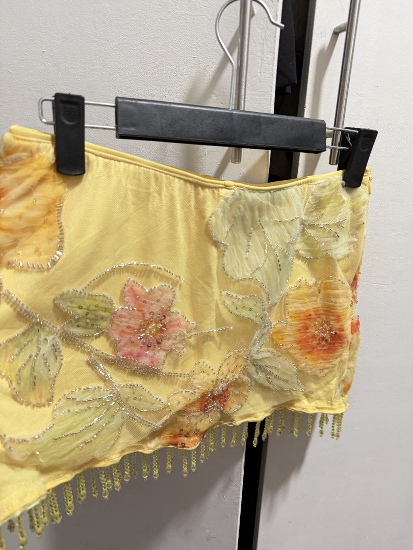 RARE Beaded Y2k yellow skirt (Category: Skirts) located in Pasig City. Submitted by miss_abuelita (Listing ID 1460906697, Image 3). Description: Waist 25-26” Length 10”.