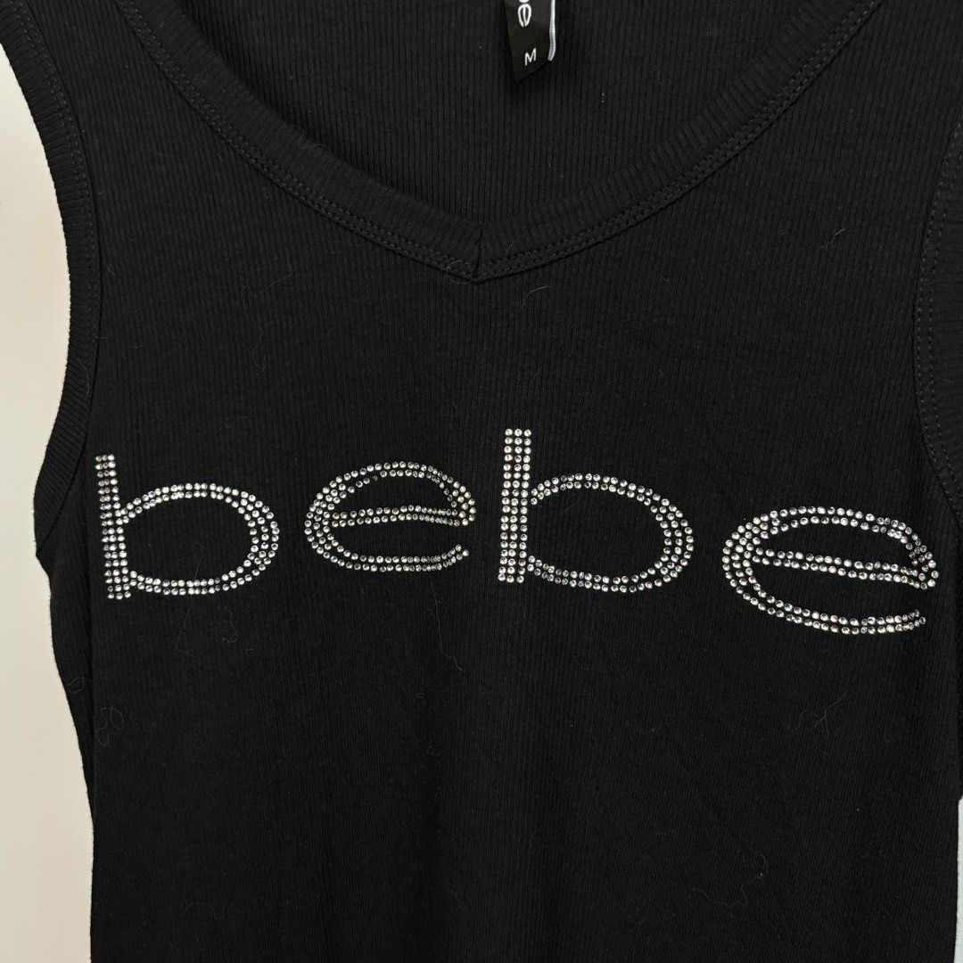 Bebe Black Rhinestone Top (Category: Sleeveless) located in Bulacan. Submitted by citygirl00 (Listing ID 1460735559, Image 2). Description: Size M on tag Few missing rhinestones .