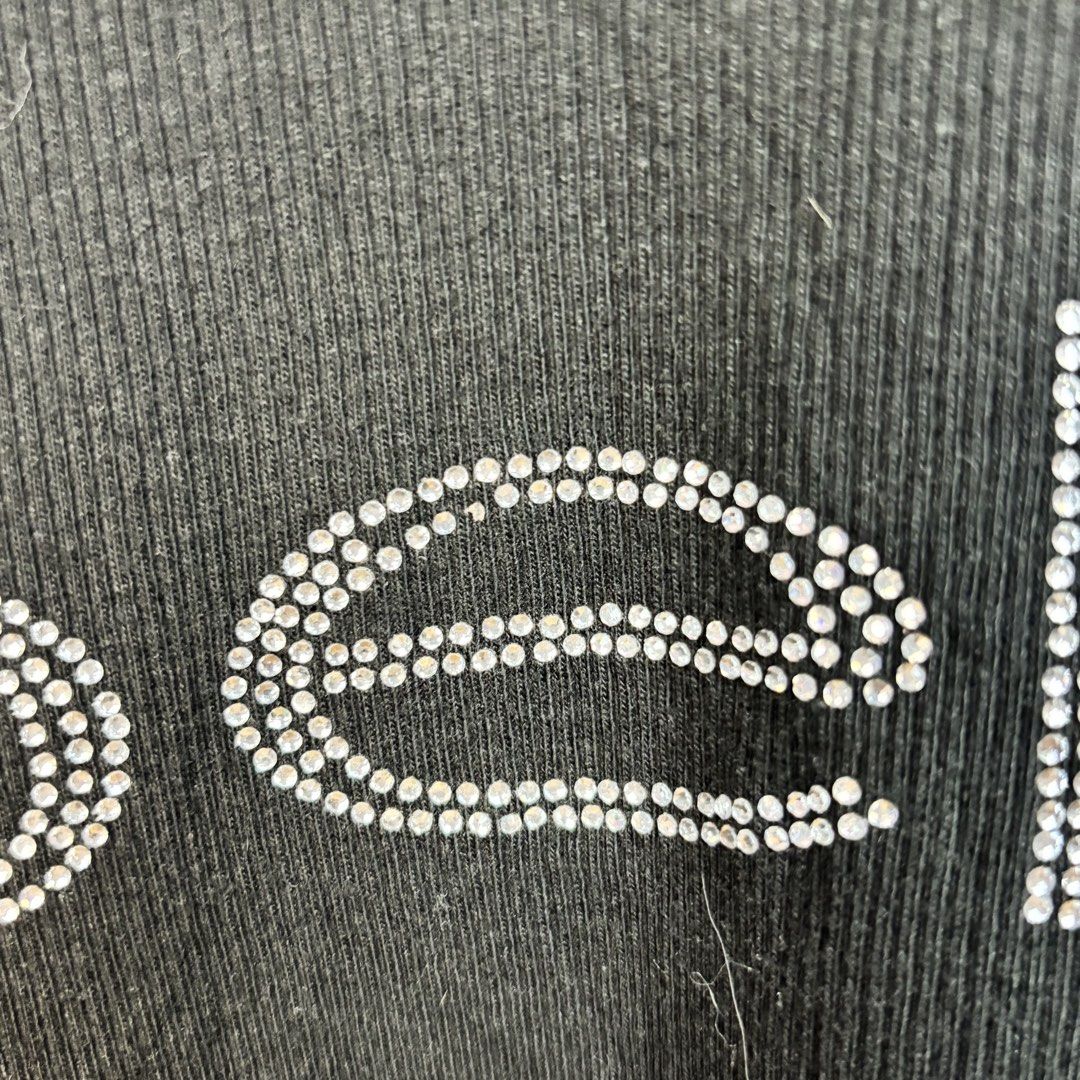 Bebe Black Rhinestone Top (Category: Sleeveless) located in Bulacan. Submitted by citygirl00 (Listing ID 1460735559, Image 3). Description: Size M on tag Few missing rhinestones .