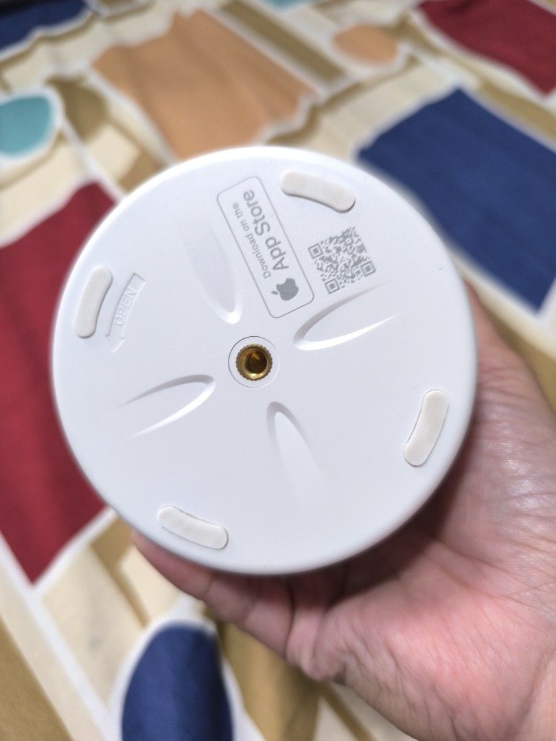 Belkin Wireless Charger Stand (Category: Chargers & Cables) located in Caloocan City. Submitted by chefems0721 (Listing ID 1460799465, Image 2). Description: - White Belkin wireless charger stand - Circular base with vertical arm - Charging pad for phones - Rubber feet for enhanced stability - Features QR code and App Store logo on the base.