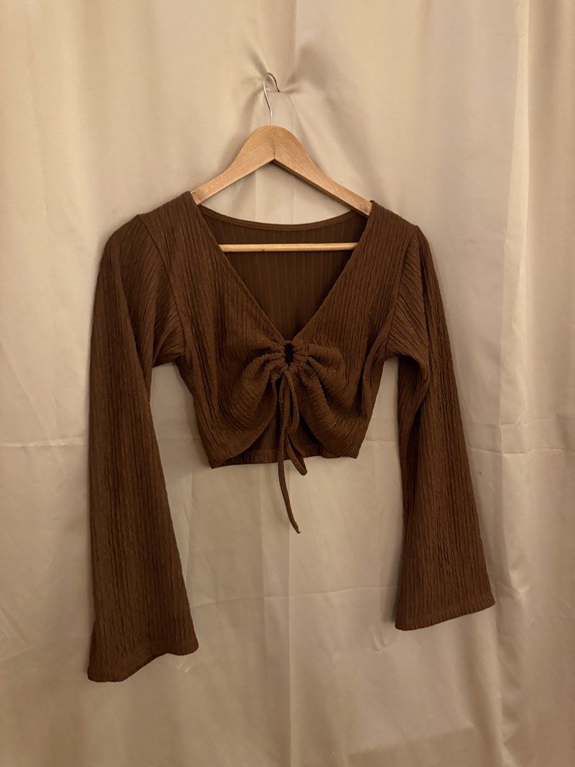 Bell sleeve brown croptop (Category: Blouses) located in Manila. Submitted by 414studio (Listing ID 1460896988, Image 2). Description: Free size Small to medium.