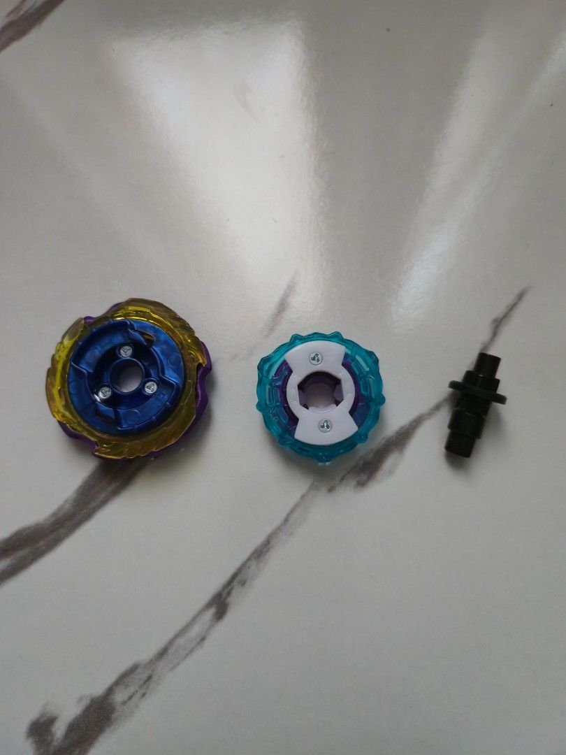 BEYBLADE X UX-21 SILVER WOLF PURPLE COATED (Category: Action & Battle Toys) located in Quezon City. Submitted by aisarang_u (Listing ID 1460778610, Image 3). Description: -UX-21 SILVER WOLF PURPLE COATED 9-70 RUSH (BLACK) -A5 A6 MOLD -UNSEALED, UNUSED -750 -location: Quezon City.
