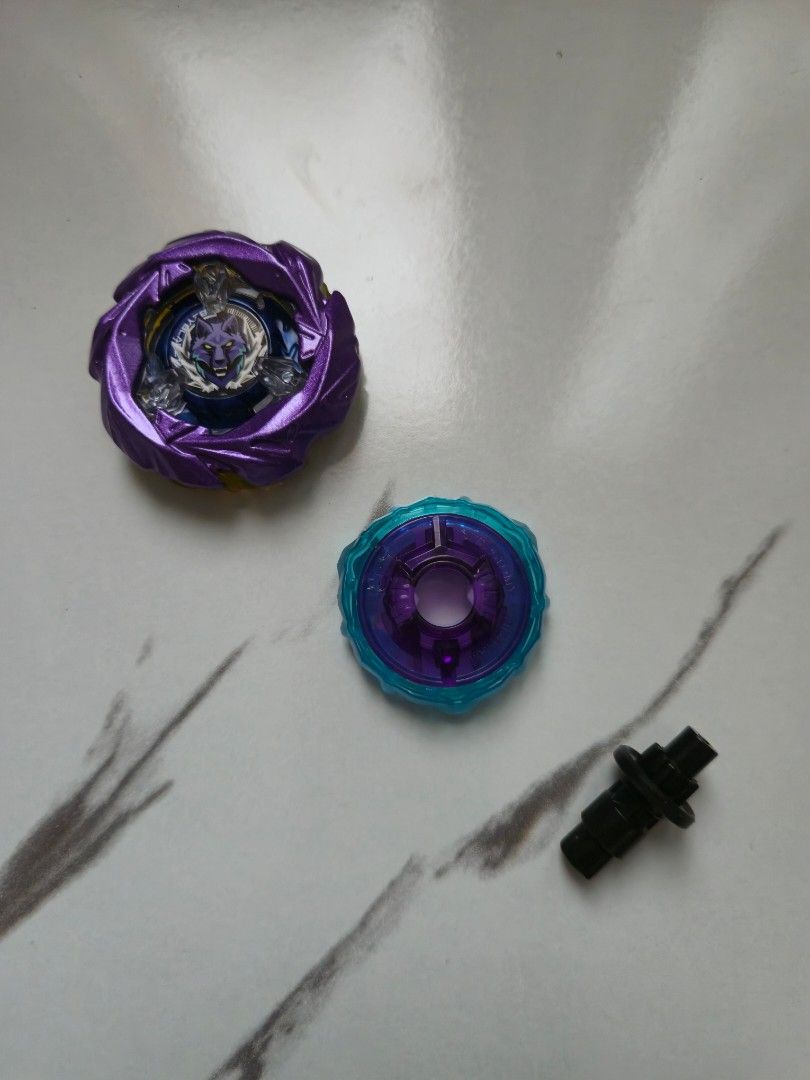 BEYBLADE X UX-21 SILVER WOLF PURPLE COATED (Category: Action & Battle Toys) located in Quezon City. Submitted by aisarang_u (Listing ID 1460778610, Image 1). Description: -UX-21 SILVER WOLF PURPLE COATED 9-70 RUSH (BLACK) -A5 A6 MOLD -UNSEALED, UNUSED -750 -location: Quezon City.