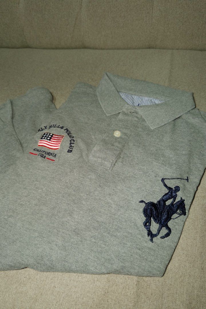 BHPC Gray Polo Shirt USA Large (Category: Tshirts & Polo Shirts ) located in Makati City. Submitted by ray_sells (Listing ID 1460782448, Image 2). Description: Second Hand Item (Personal Wardrobe) - What you see is what you get. - Used but not in a bad condition. - Reason for selling: Decluttering. .