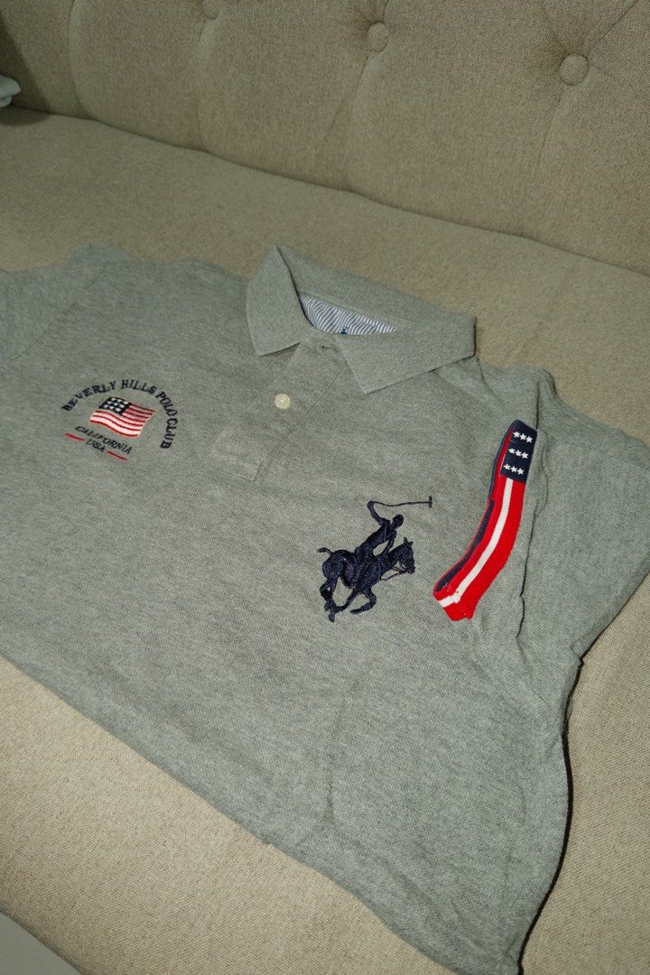BHPC Gray Polo Shirt USA Large (Category: Tshirts & Polo Shirts ) located in Makati City. Submitted by ray_sells (Listing ID 1460782448, Image 1). Description: Second Hand Item (Personal Wardrobe) - What you see is what you get. - Used but not in a bad condition. - Reason for selling: Decluttering. .
