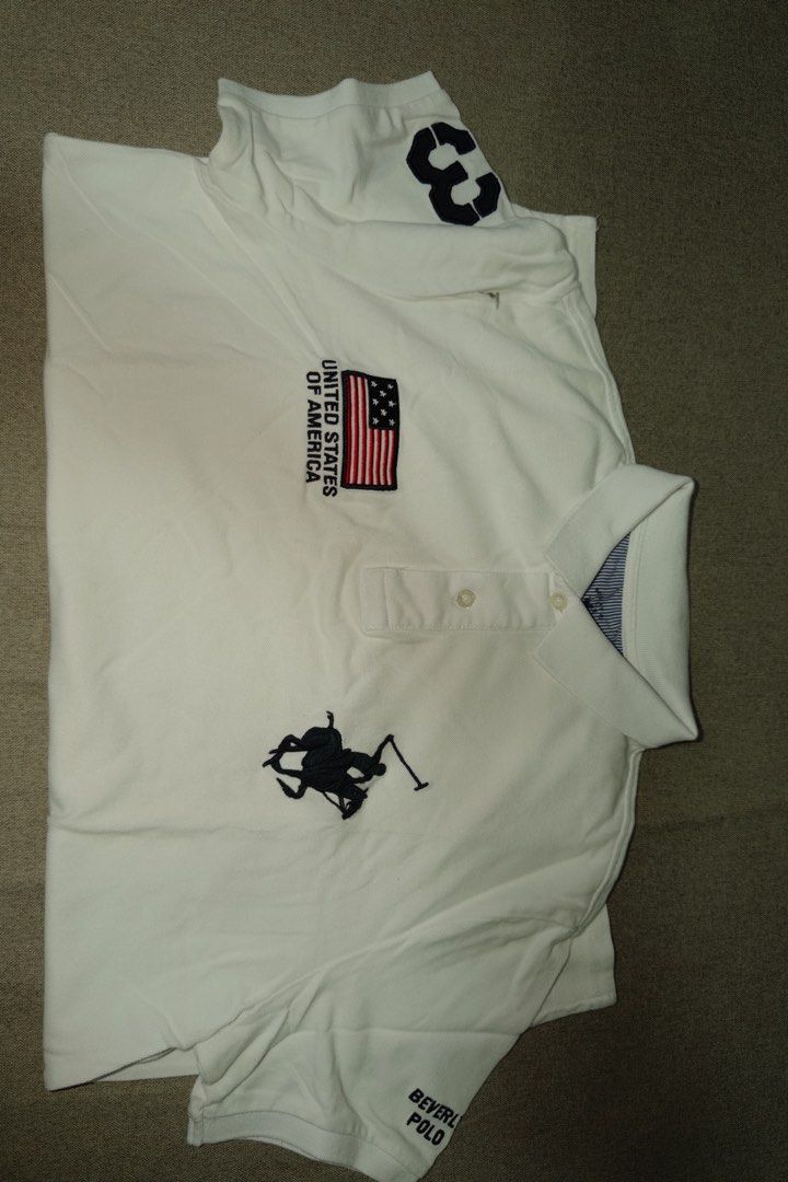 BHPC White Polo Shirt M-L (Category: Tshirts & Polo Shirts ) located in Makati City. Submitted by ray_sells (Listing ID 1460784223, Image 2). Description: Second Hand Item (Personal Wardrobe) - What you see is what you get. - Used but not in a bad condition. - Reason for selling: Decluttering. .