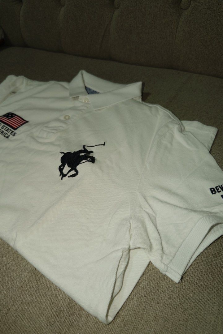 BHPC White Polo Shirt M-L (Category: Tshirts & Polo Shirts ) located in Makati City. Submitted by ray_sells (Listing ID 1460784223, Image 1). Description: Second Hand Item (Personal Wardrobe) - What you see is what you get. - Used but not in a bad condition. - Reason for selling: Decluttering. .