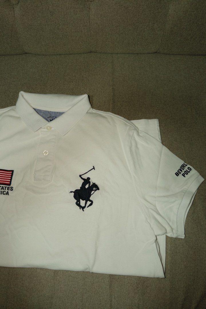 BHPC White Polo Shirt M-L (Category: Tshirts & Polo Shirts ) located in Makati City. Submitted by ray_sells (Listing ID 1460784223, Image 3). Description: Second Hand Item (Personal Wardrobe) - What you see is what you get. - Used but not in a bad condition. - Reason for selling: Decluttering. .
