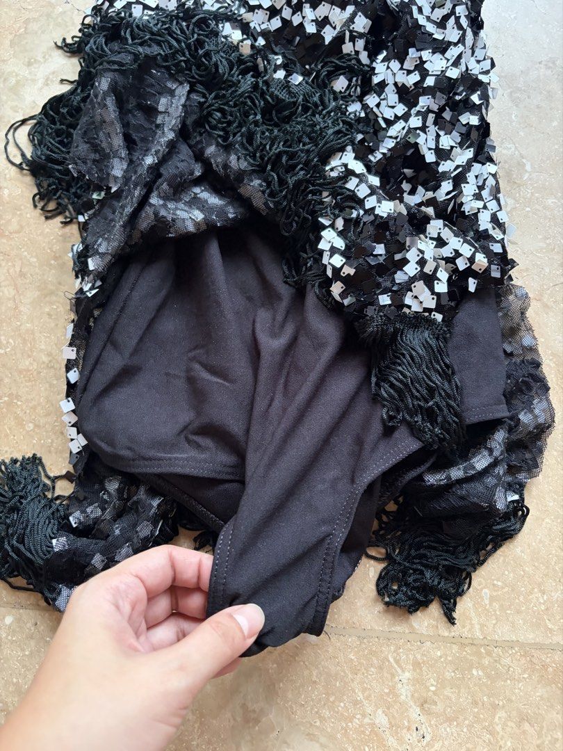 Black and White Sequin Fringe Flapper Dress (Category: Dresses) located in Quezon City. Submitted by tidyup.lara (Listing ID 1460919236, Image 3). Description: Best fits XS-S frames Bust 26” Waist 28” Length 31” Condition 9/10: good as new.