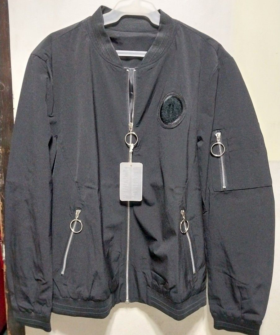 Black Bomber Jacket with Circular carpeted patch 11 (Category: Coats, Jackets and Outerwear) located in Manila. Submitted by PrinceDani.Clothing (Listing ID 1460754874, Image 1). Description: Black bomber jacket large 22in width 29in length brand new .