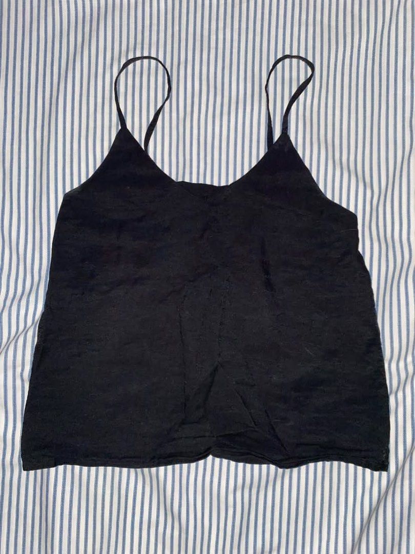Black Cami Top with Adjustable Straps (Category: Sleeveless) located in Manila. Submitted by _dayanughhhh (Listing ID 1460874333, Image 1). Description: - Basic black cami top - Thin, adjustable straps - Fabric with a slight sheen - Smocked/elasticated back panel for a better fit - Versatile: great for layering or wearing on its own - Easy to pair with any outfit.