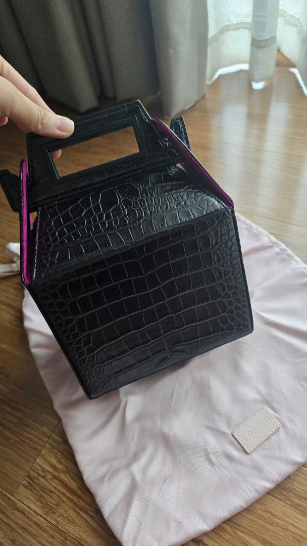 Black Crocodile Effect Top Handle Bag with Chain (Category: Luxury Bags & Wallets) located in Paranaque City. Submitted by monicaher (Listing ID 1460749855, Image 2). Description: - Retails at 255 usd - Used few times only, just stored in the cabinet - Black croc-effect top handle bag - Bright pink interior lining - Detachable chain strap included - Comes with dust bag and tags.