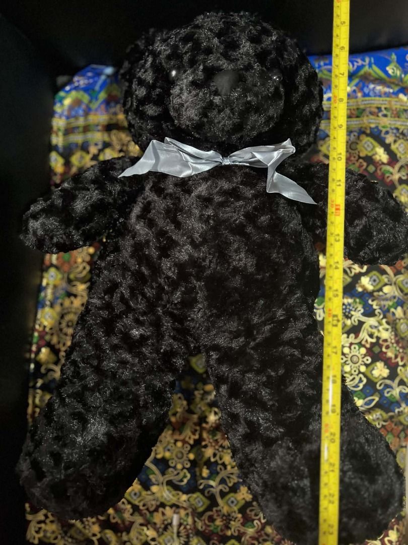 Black Curly Fur Teddy Bear with Grey Bow (Category: Plushies & Soft Toys) located in Davao. Submitted by ajonlineshop.24 (Listing ID 1460721939, Image 1). Description: - Adorable black teddy bear - Features soft, curly fur - Adorned with a grey satin ribbon bow - Approximately 18 inches tall - Super soft and huggable - Ideal for cuddling or as a charming decoration.