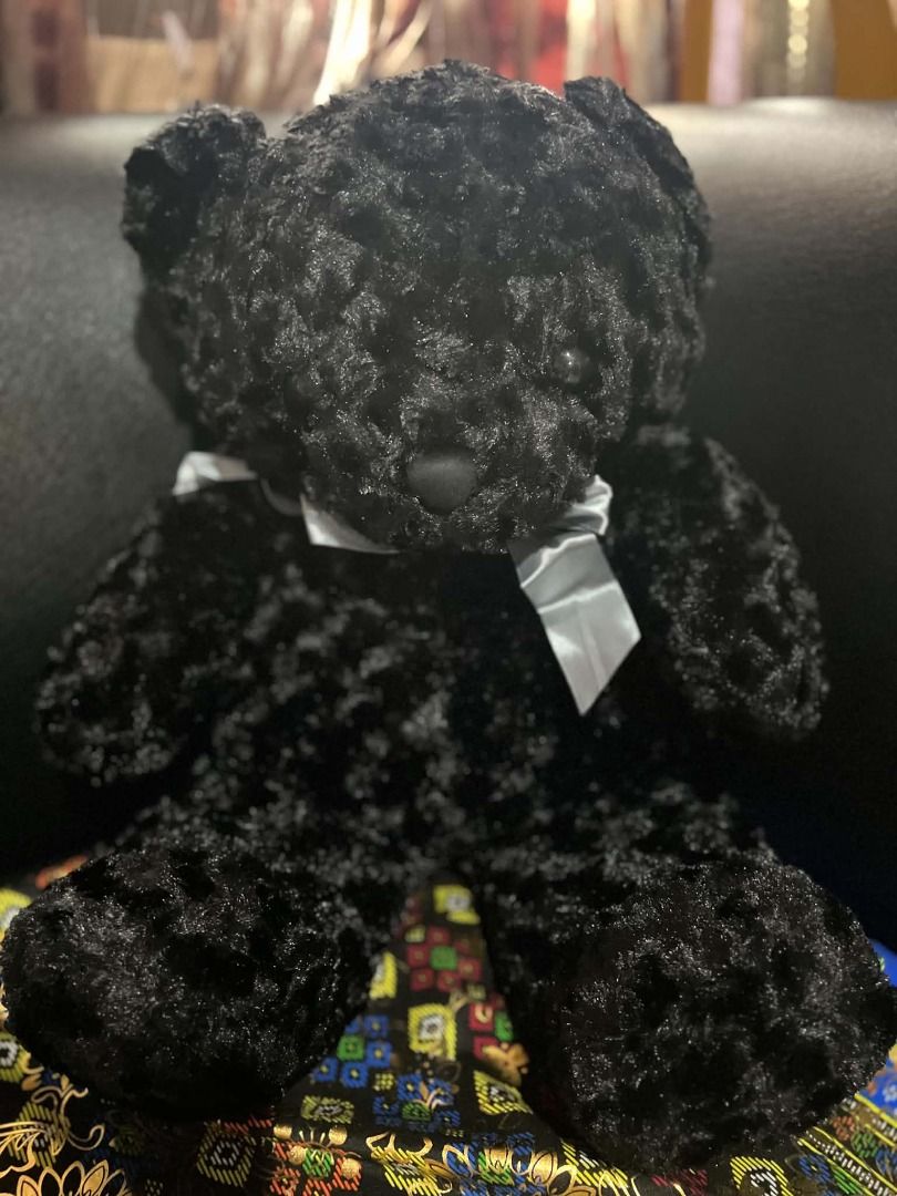 Black Curly Fur Teddy Bear with Grey Bow (Category: Plushies & Soft Toys) located in Davao. Submitted by ajonlineshop.24 (Listing ID 1460721939, Image 2). Description: - Adorable black teddy bear - Features soft, curly fur - Adorned with a grey satin ribbon bow - Approximately 18 inches tall - Super soft and huggable - Ideal for cuddling or as a charming decoration.