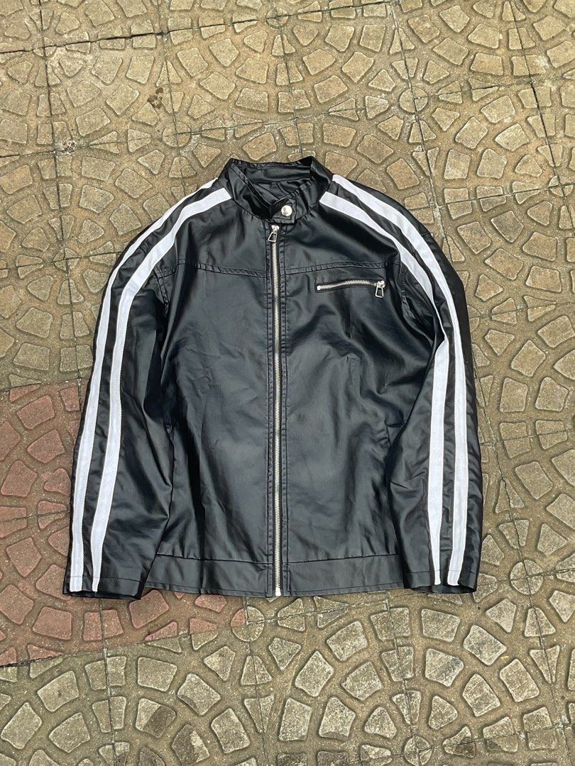Black Jacket with White Stripes (Category: Coats, Jackets and Outerwear) located in Mabalacat. Submitted by epicforest_78284 (Listing ID 1460787579, Image 1). Description: - Stylish black jacket - Features white stripes on sleeves - Full zip-up front closure - Convenient small zip pocket on chest - Ideal for casual outfits - Pairs well with jeans or track pants.