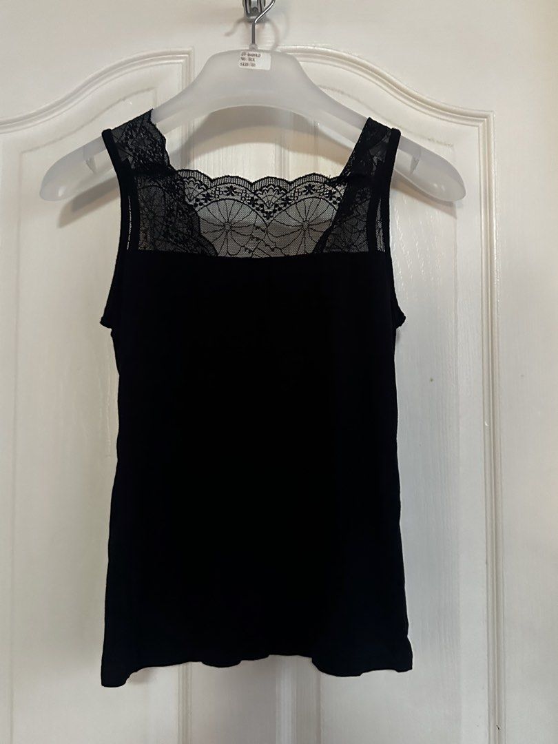 Black Lace Trim Tank Top (Category: Sleeveless) located in Manila. Submitted by nfcloset_ (Listing ID 1460789881, Image 3). Description: - Elegant black tank top - Features a stylish square neckline with lace trim - Soft and comfortable fabric - Versatile: Ideal for layering or as a standalone piece - Simple yet chic design.