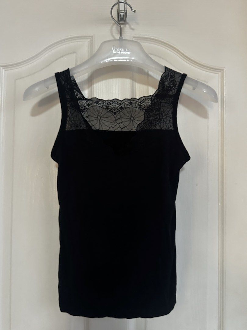 Black Lace Trim Tank Top (Category: Sleeveless) located in Manila. Submitted by nfcloset_ (Listing ID 1460789881, Image 1). Description: - Elegant black tank top - Features a stylish square neckline with lace trim - Soft and comfortable fabric - Versatile: Ideal for layering or as a standalone piece - Simple yet chic design.