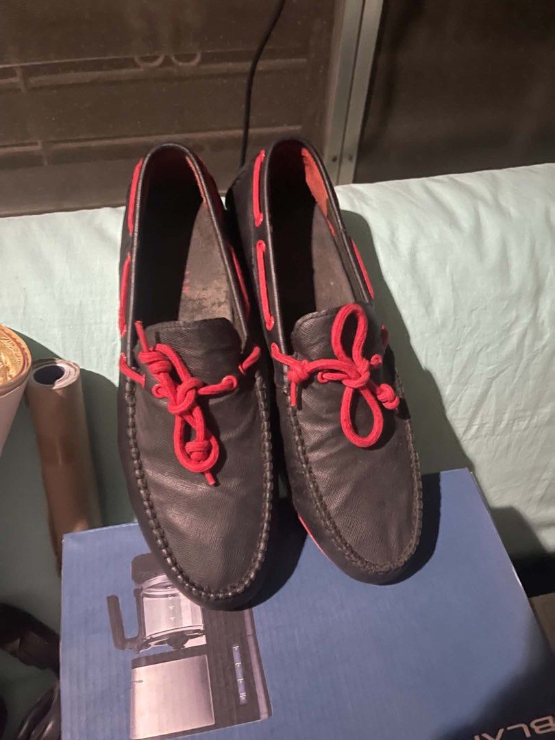 Black Loafers with Red Laces (Category: Casual Shoes) located in Makati City. Submitted by d.hearts (Listing ID 1460865468, Image 1). Description: - Classic black moccasin loafers - Features bright red laces and red soles - Versatile for casual or dressier occasions - Lightly used, with plenty of wear left - Ready for a new owner.