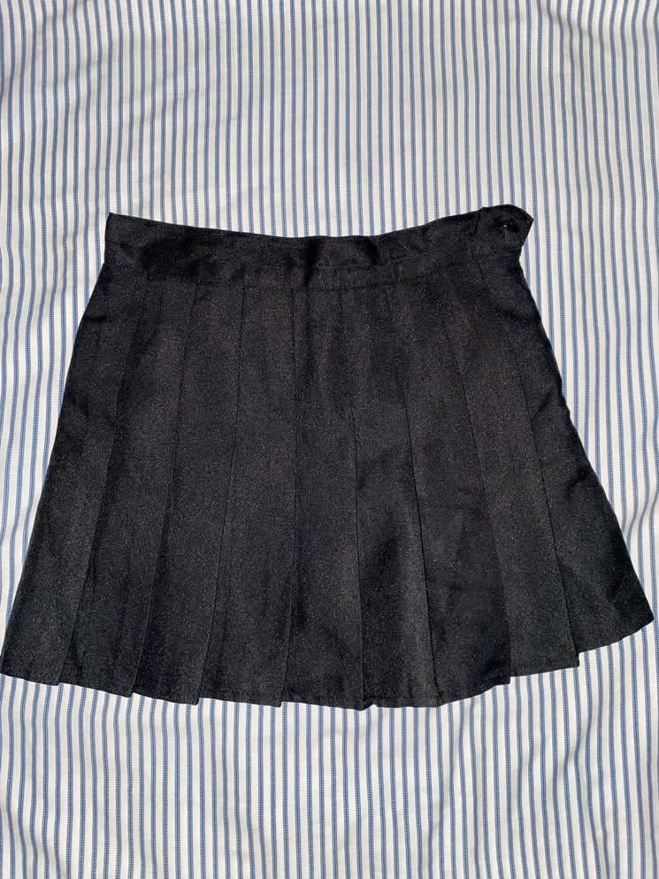 Black Pleated Mini Skirt (Category: Skirts) located in Manila. Submitted by _dayanughhhh (Listing ID 1460874534, Image 1). Description: - Black pleated mini skirt - Fits size Small to Medium - Versatile: great for casual or dressed-up looks - Easy to pair with various tops and shoes - Well-defined pleats - Perfect for school or going out.